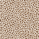 Detail of fabric in a painterly animal print in brown and tan on a cream field.