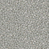 Detail of wallpaper in a painterly animal print in white and tan on a blue-gray field.