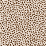Detail of wallpaper in a painterly animal print in shades of brown on a cream field.