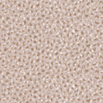 Detail of wallpaper in a painterly animal print in cream and brown on a dusty pink field.