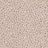 Detail of wallpaper in a painterly animal print in cream and brown on a dusty pink field.