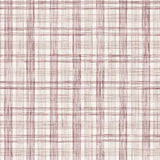 Fabric with watercolor plaid pattern in shades of wine red.