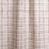 Draped fabric with watercolor plaid pattern in shades of wine red.