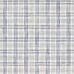 Fabric with watercolor plaid pattern in shades of blue. 