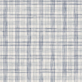 Fabric with watercolor plaid pattern in shades of blue. 
