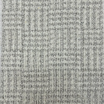 Broadloom carpet with houndstooth check pattern in cream and light grey.