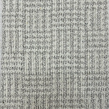 Broadloom carpet with houndstooth check pattern in cream and light grey.