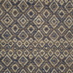 Handwoven rug detail in a diamond design in blue, cream and yellow