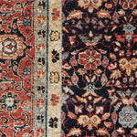 Close-up of a patterned rug with intricate designs.