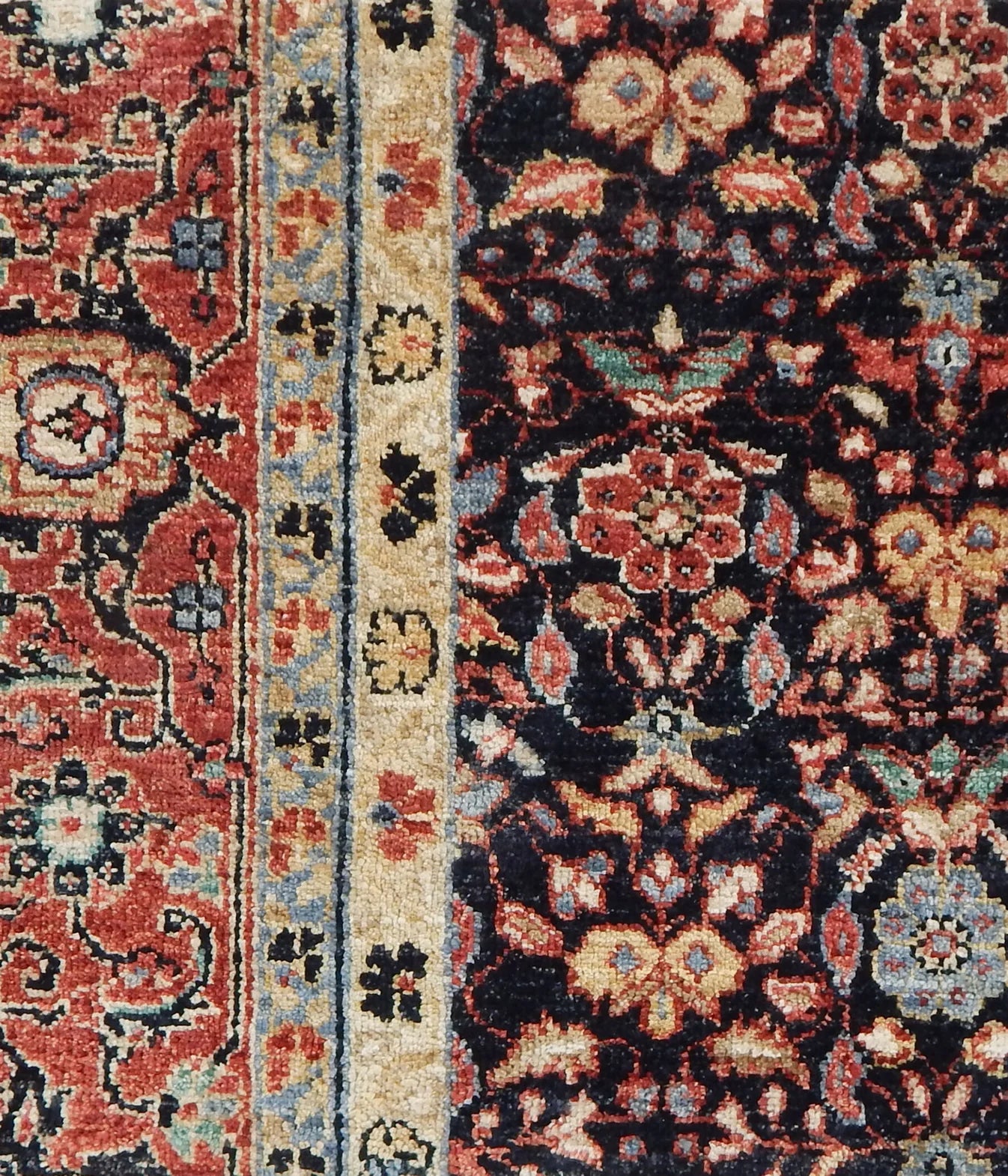 Close-up of a patterned rug with intricate designs.