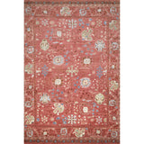 Decorative rug with intricate patterns on a red background