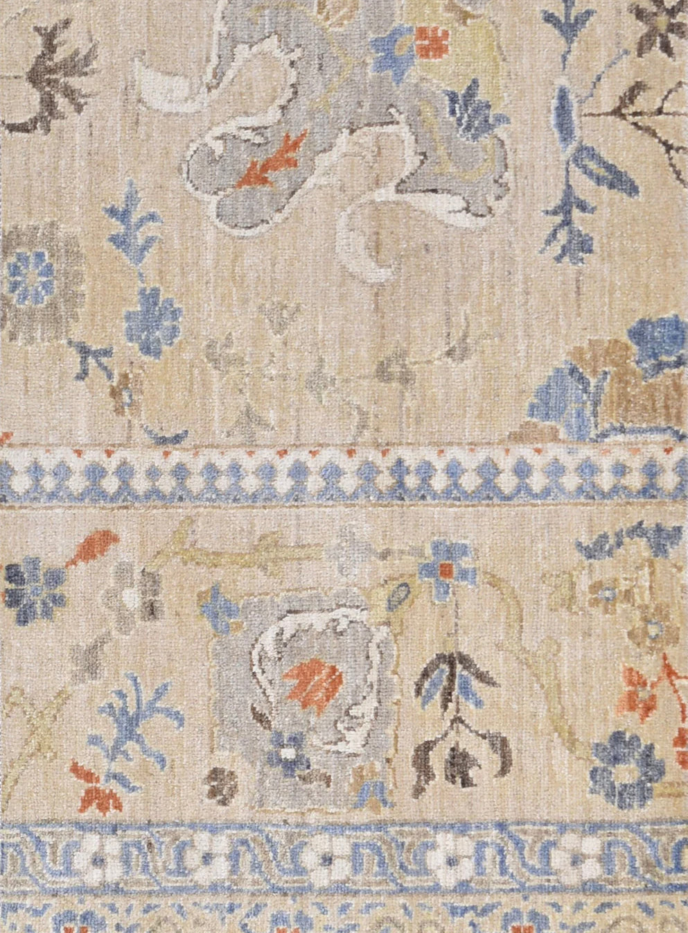 Decorative rug with floral and geometric patterns on a beige background