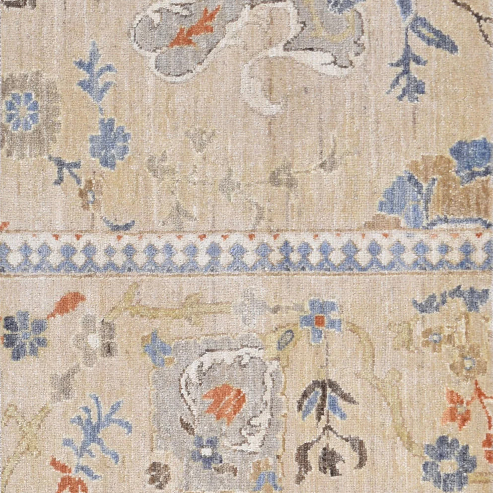 Decorative rug with floral and geometric patterns on a beige background