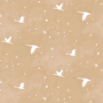 Flying geese and star pattern in white on a warm tan watercolor field. 