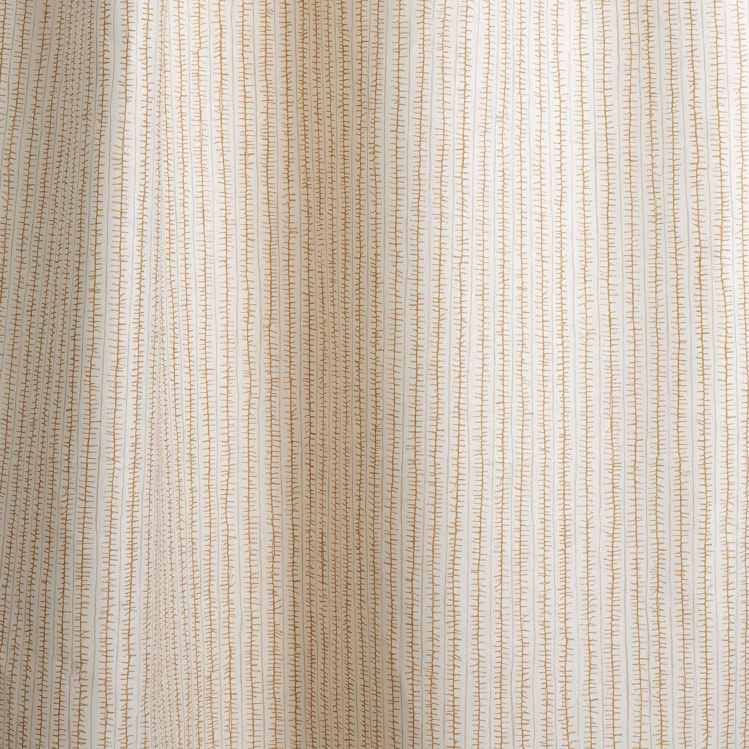 Draped fabric with hand drawn ticking stripe in caramel and grey on white.