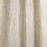 Draped fabric with hand drawn ticking stripe in olive green and brown on white. 