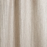 Draped fabric with hand drawn ticking stripe in black and taupe on white.