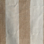 Close-up of fabric with brown and beige striped pattern