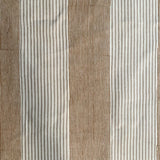 Close-up of fabric with brown and beige striped pattern
