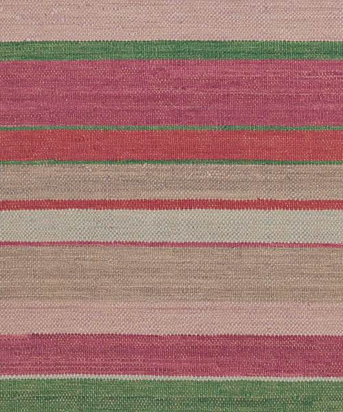 Flatweave rug in a mixed width stripe in fuchsia, coral, green, taupe and aqua.