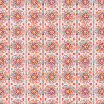 Full repeat image of a hand-drawn Suzani motif in shades of pink, orange and slate blue on a pale pink ground.