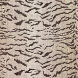 Broadloom carpet in a tiger inspired pattern in shades of brown.