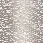 Broadloom carpet in a tiger inspired pattern in shades of taupe.