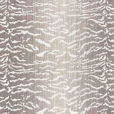 Broadloom carpet in a tiger inspired pattern in shades of taupe.