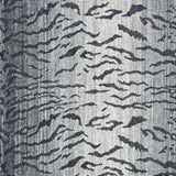 Broadloom carpet in a tiger inspired pattern in shades of blue.