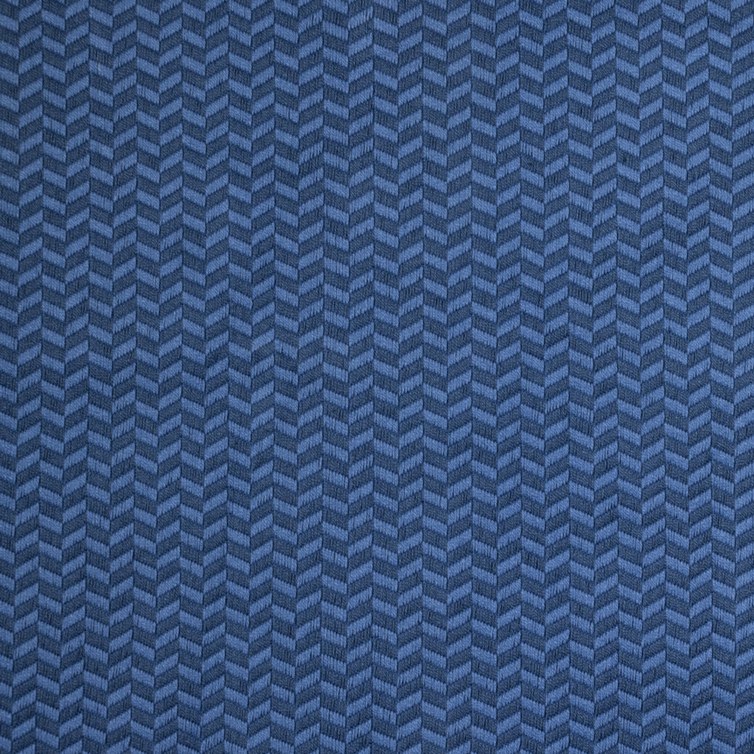 Herringbone woven fabric in blue.