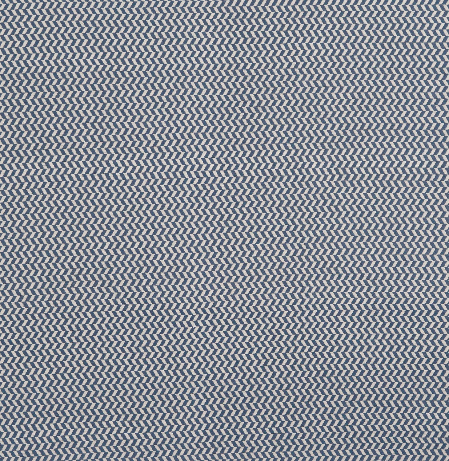 Herringbone woven fabric in beige and cream.