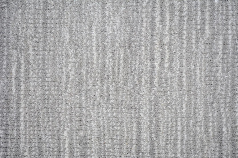 Broadloom carpet swatch in a textural pattern in a light grey design