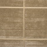 Textural performance broadloom carpet in grid design in tan.