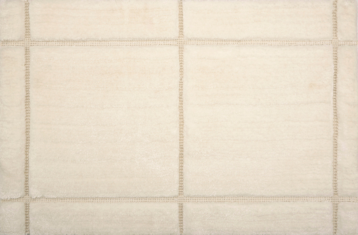 Textural performance broadloom carpet in grid design in cream