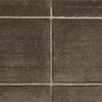 Textural performance broadloom carpet in grid design in brown