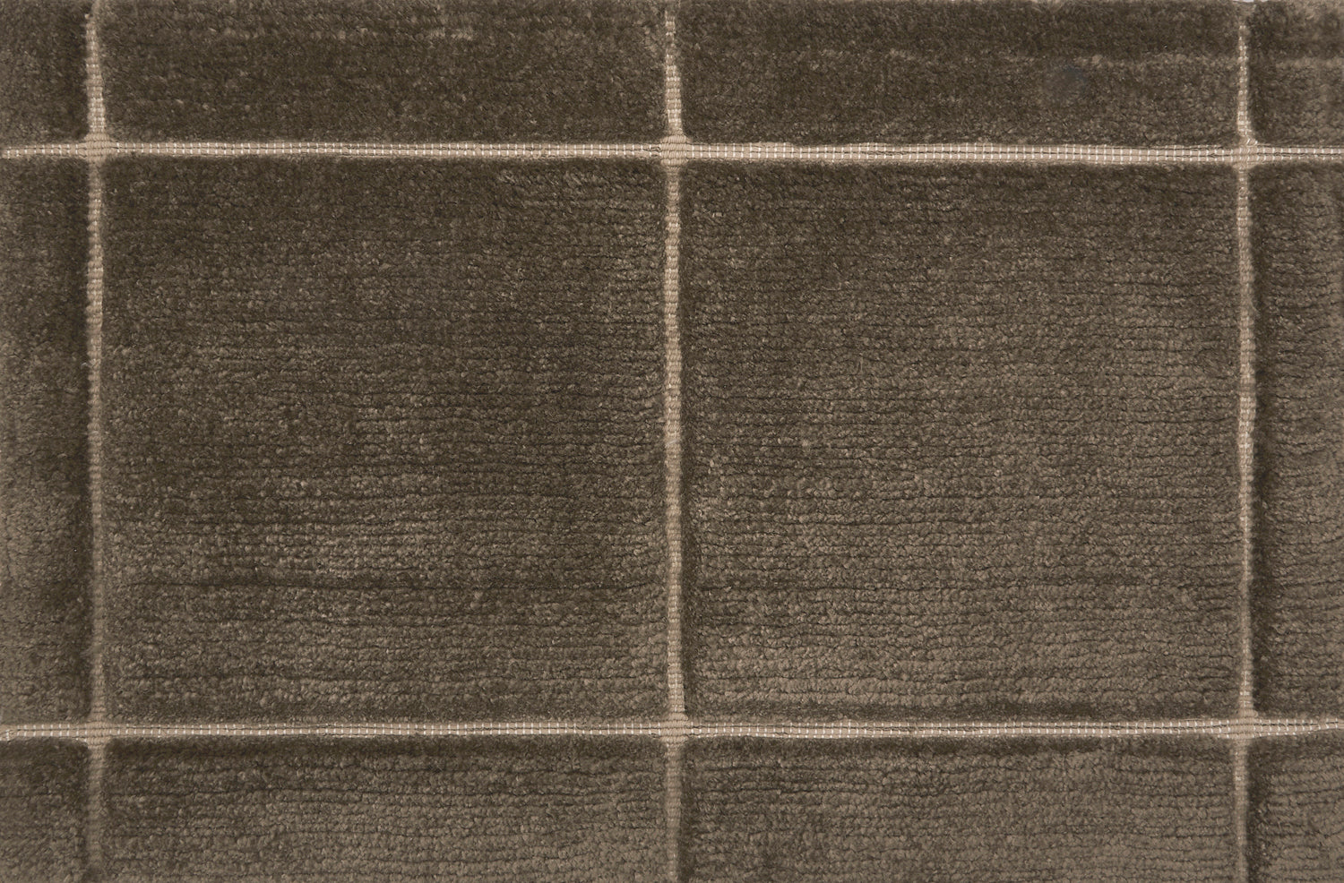Textural performance broadloom carpet in grid design in brown