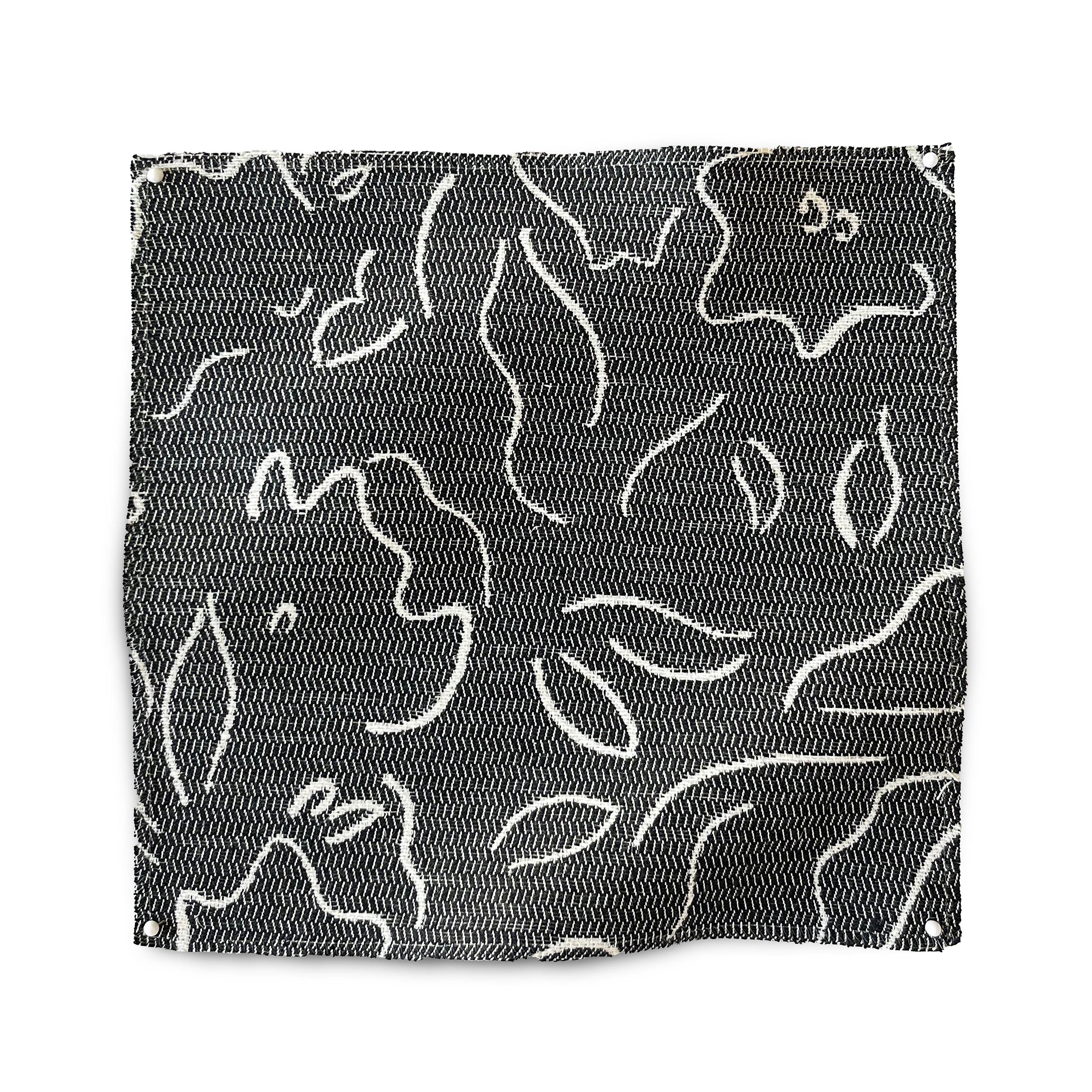 Square fabric swatch in a minimalist floral print in cream on a charcoal field.