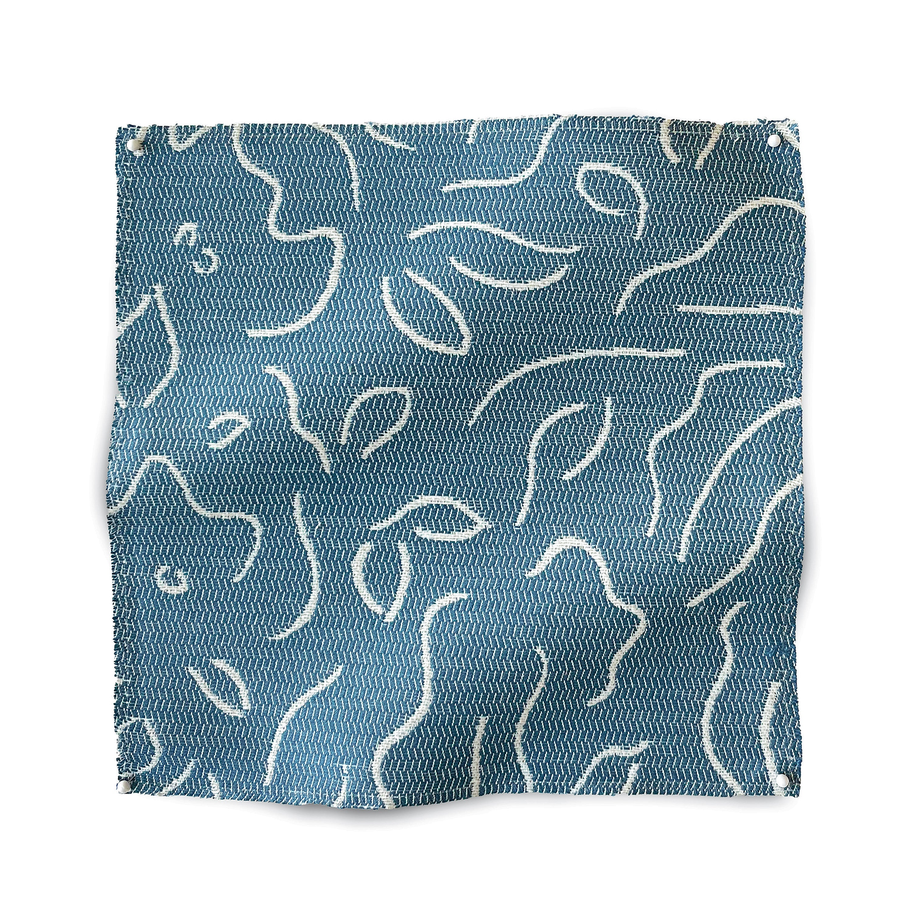 Square fabric swatch in a minimalist floral print in cream on a navy field.