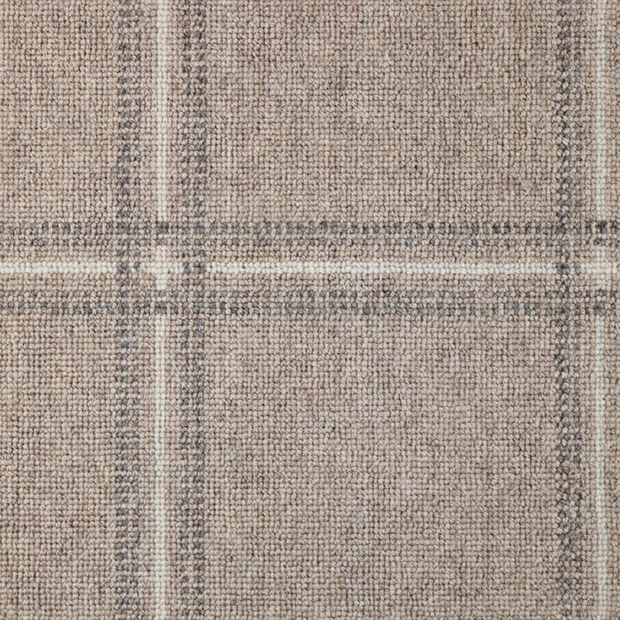 Broadloom carpet with window pane check in white and grey on beige.