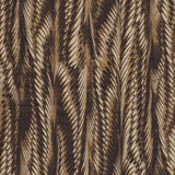 Detail of fabric in a marbled paint print in shades of brown and tan.