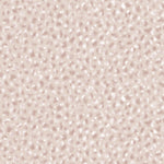 Detail of fabric in a painterly animal print in pastel pink with white accents. 