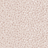 Detail of fabric in a painterly animal print in pastel pink with white accents. 