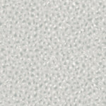 Detail of wallpaper in a painterly animal print in shades of cool blue and white. 