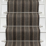 Striped flatweave runner in dark grey and black on white staircase