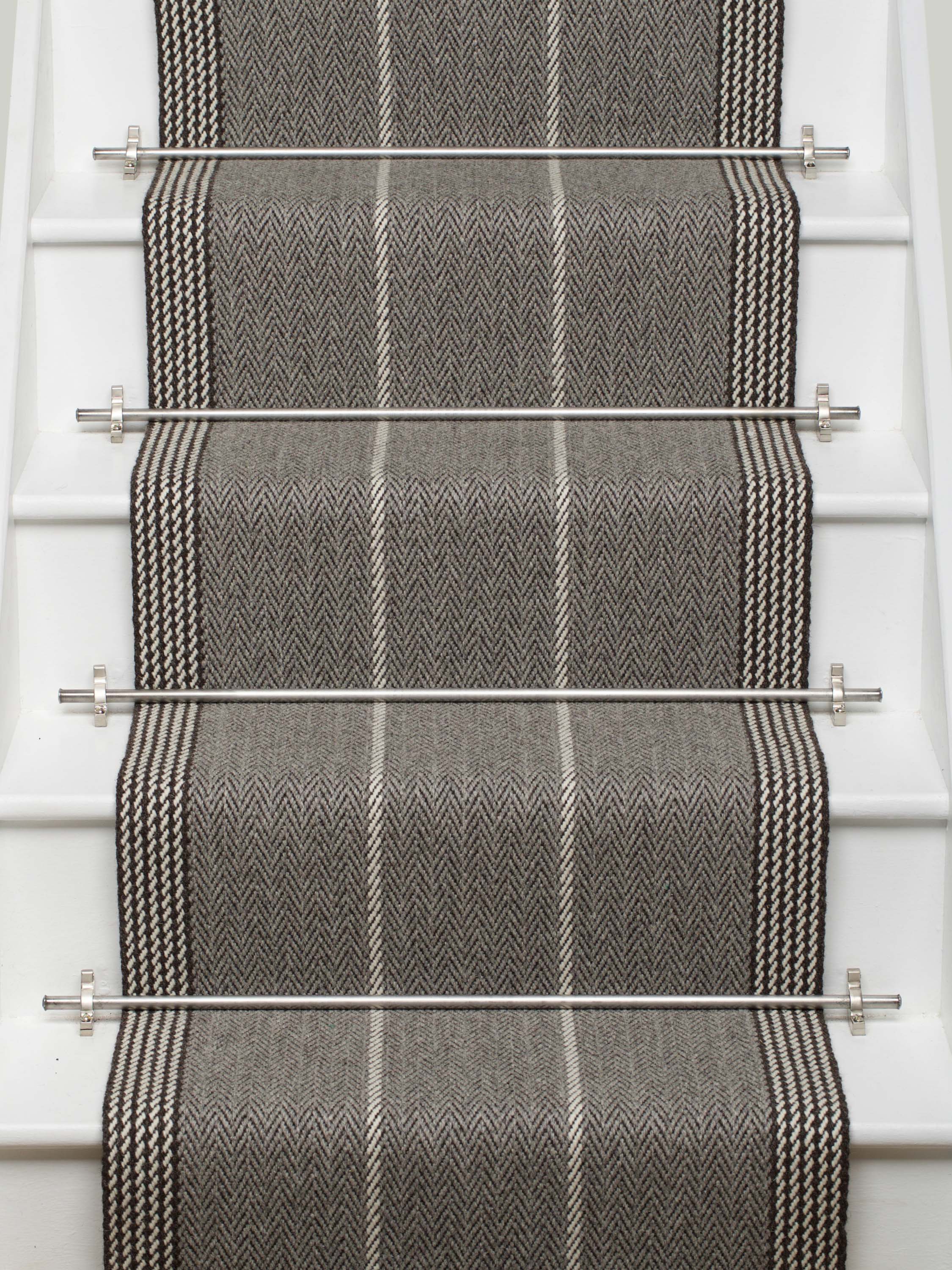 Striped flatweave runner in grey and black on white staircase