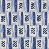 A close-up of a repeating geometric pattern featuring navy blue textured vertical bars, diagonal striped rectangles, and thin horizontal lines on a white background.