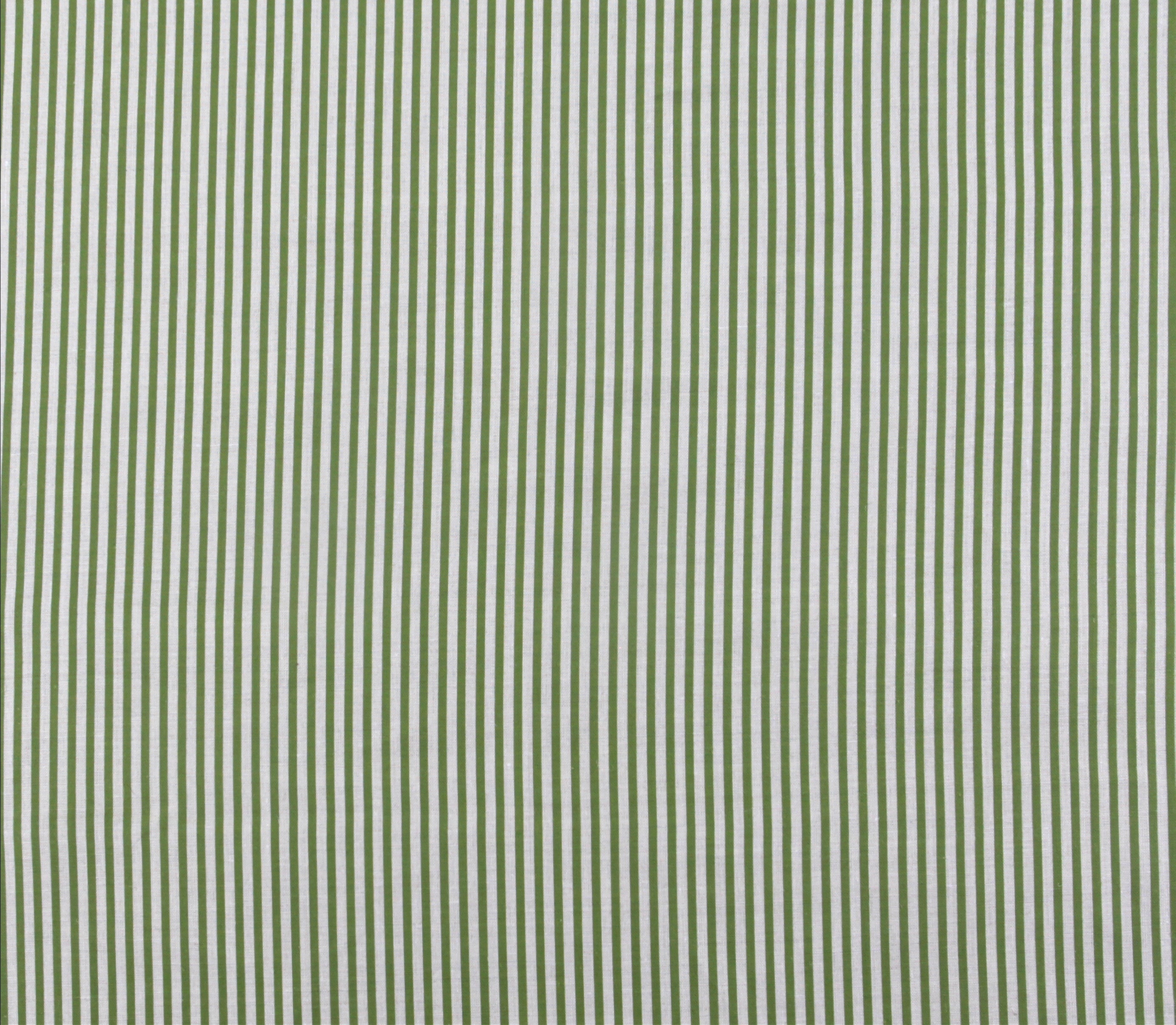 Detail of fabric in a small-scale stripe print in green on a greige field.