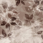 Close up detail of wallpaper in a painterly leaf print in shades of warm wine purple with a mottled white overlay.