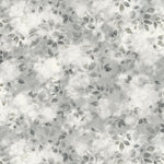 Detail of wallpaper in a painterly leaf print in shades of cool steel grey with a mottled white overlay.