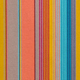 Detail of outdoor fabric in an irregular rainbow stripe print.